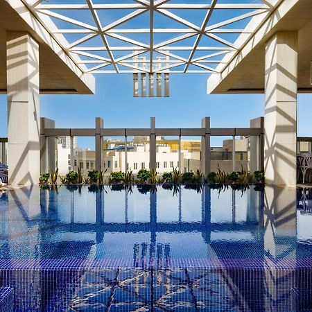 Millennium Place ドーハ エクステリア 写真 The rooftop pool at the Four Seasons Hotel, Cairo