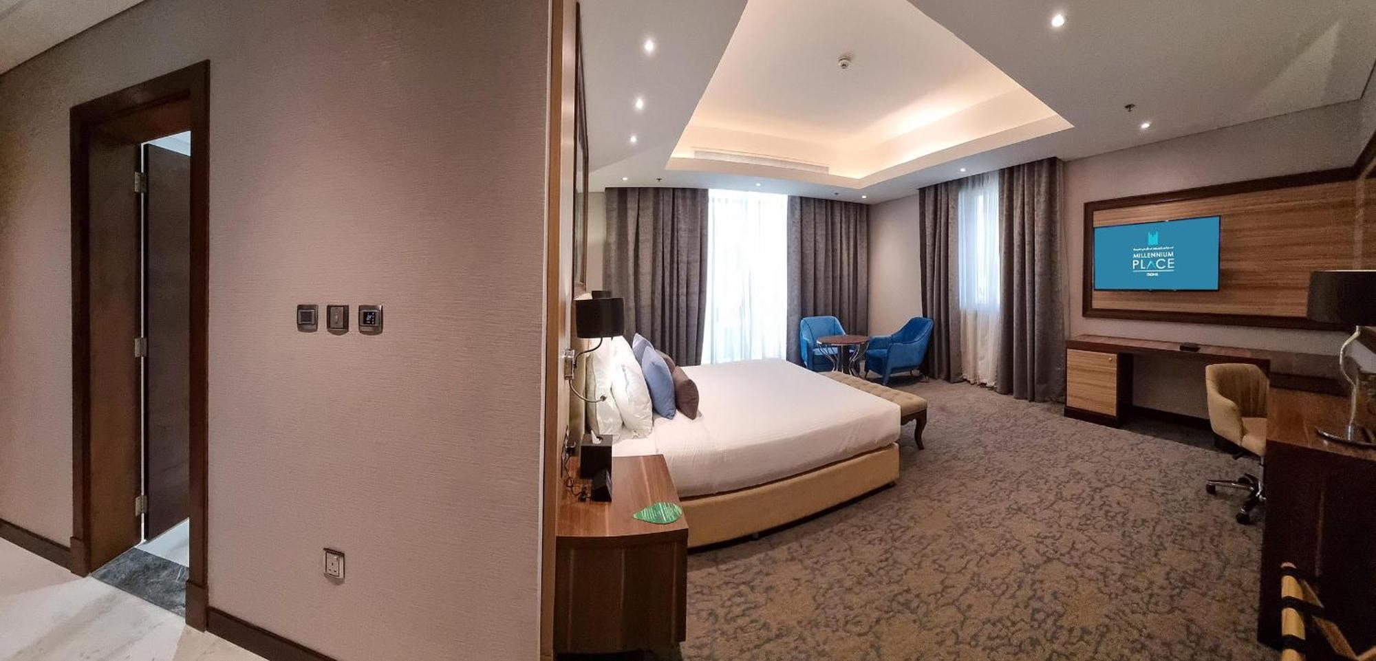Millennium Place ドーハ エクステリア 写真 A bedroom at the hotel